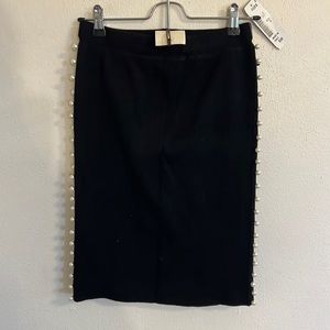 Black bodycon pencil skirt with pearl side detail.